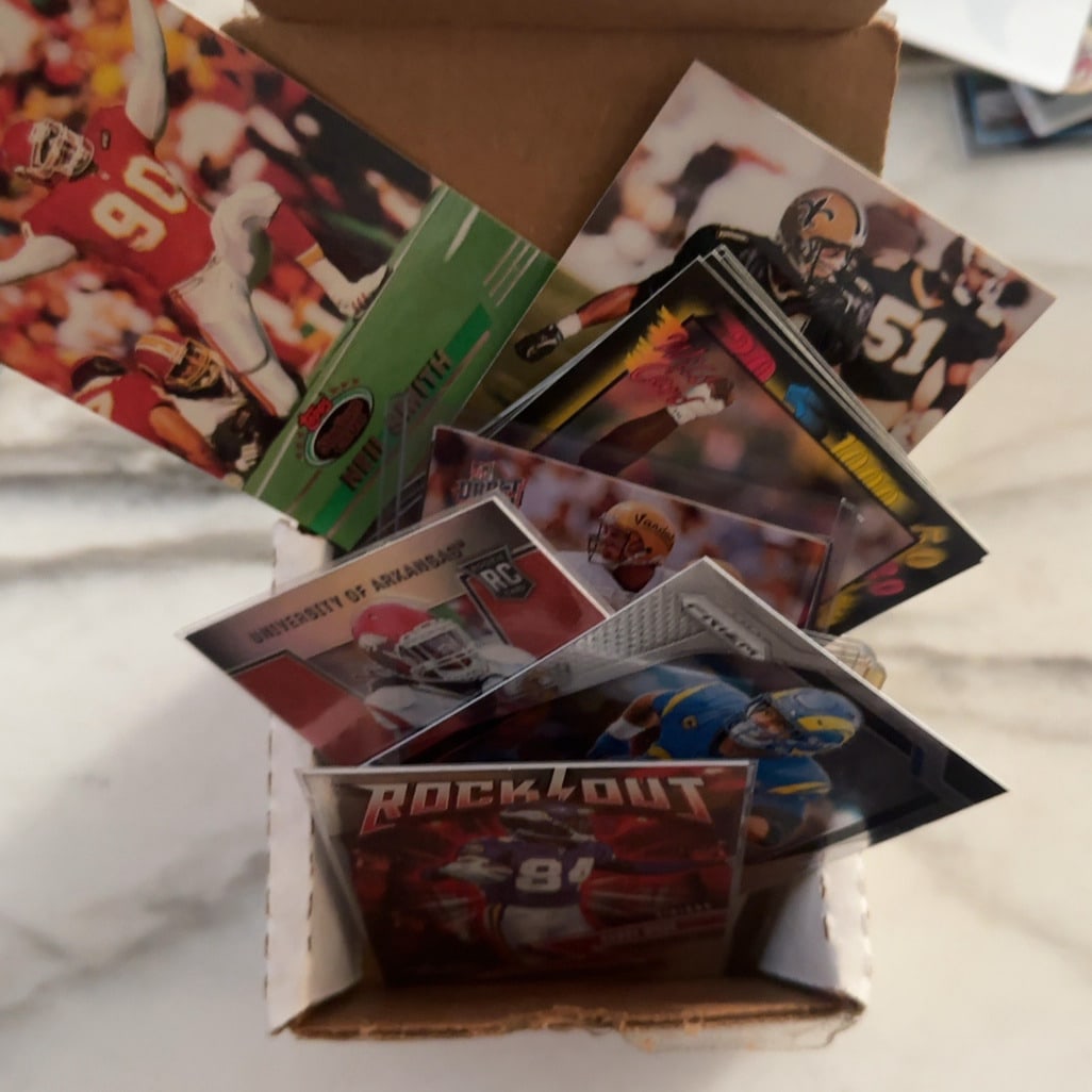 Unsorted - Short - Small Box of Misc NFL Cards: Short - Small Single-row card storage box, count box -unsorted misc years and type NFL / from estate sale _ the bulk wax and a few Modern single row -mostly - NFL. Did not sort for players -sold as is