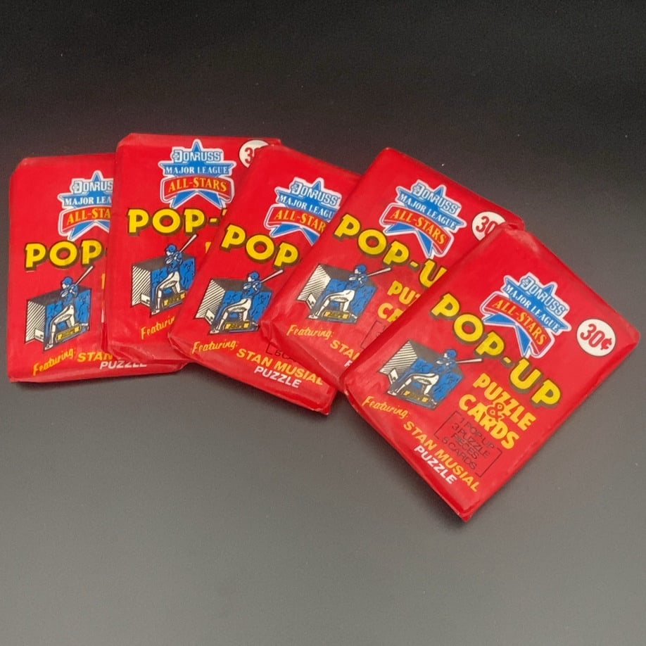 Donruss Major League All-Stars Pop-Up Puzzle Cards: ot contains five unopened vintage Donruss Major League All-Stars Pop-Up Puzzle & Cards wax packs. Each pack features a Stan Musial puzzle and includes one pop-up, three puzzle pieces, and five cards