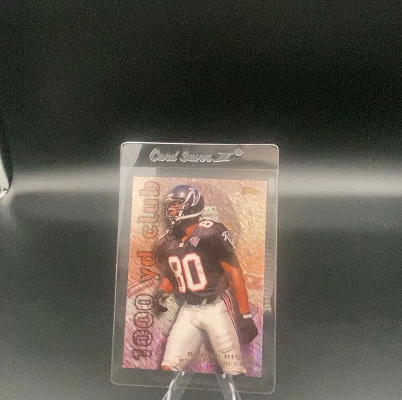 Topps 1000 yd club Andre Rison: This is a Topps trading card featuring Andre Rison as part of the 1000 yd club insert set. The card shows Rison in his Atlanta Falcons uniform and is protected in a Card Saver III sleeve.