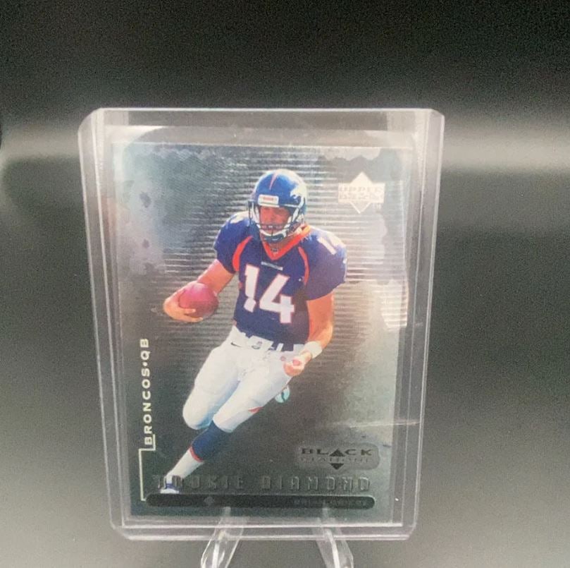 Upper Deck Black Diamond Rookie Diamond: This is an Upper Deck Black Diamond trading card featuring a Denver Broncos quarterback in his rookie season. The card showcases a distinct foil-style design and identifies the player position as a