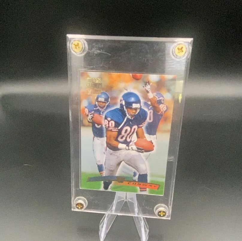 Topps Stadium Club Kevin Conway: This is a Topps Stadium Club football trading card featuring Kevin Conway wearing his team uniform. The card is encased in a protective screw-down plastic holder.