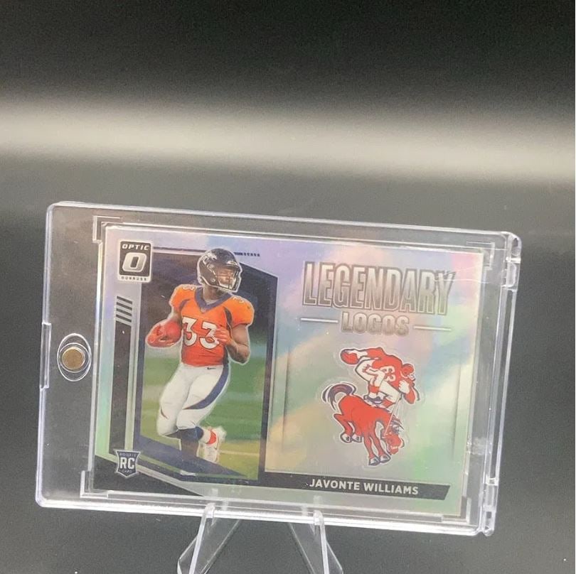 2021 Donruss Optic Javonte Williams: This is a 2021 Donruss Optic trading card featuring Javonte Williams of the Denver Broncos. It is a Legendary Logos insert card that includes the classic Denver Broncos horse logo.