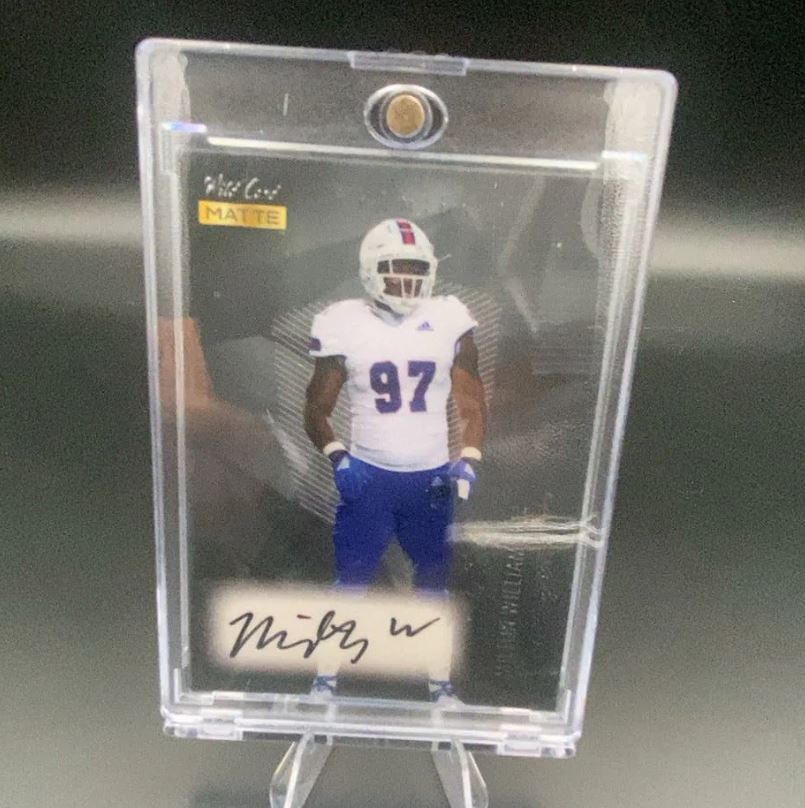 Wild Card Matte Kirby Wilson: This is a 2021 Wild Card Matte football card featuring Kirby Wilson. The card is enclosed in a protective magnetic hard case and includes a signature on the front.