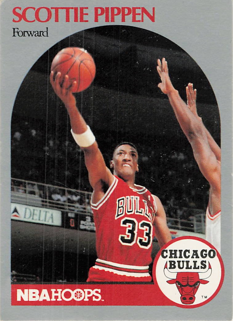 1990-91 Hoops Scottie Pippen Chicago Bulls basketball trading card (#69): This is a 1990-91 Hoops basketball trading card featuring Scottie Pippen, card number 69. The card showcases Pippen, the All-Star forward for the Chicago Bulls, during his NBA career. It is a