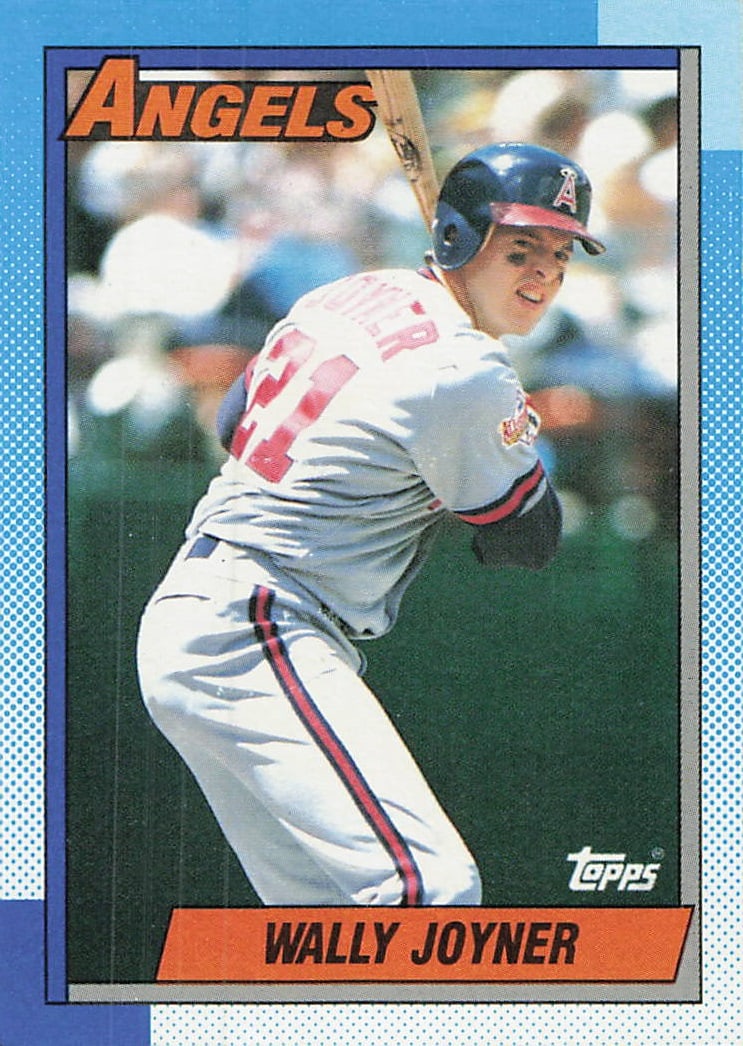 1990 Topps Wally Joyner #525 baseball card: This is a 1990 Topps baseball card featuring Wally Joyner, card number 525. The card showcases Joyner, a first baseman and designated hitter, during his Major League Baseball career. It is a standard 