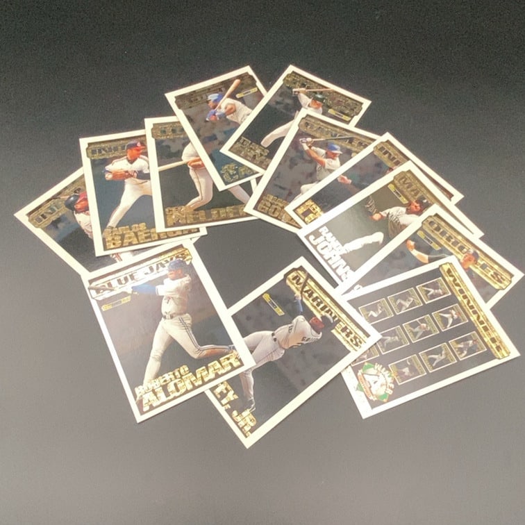 Upper Deck Baseball Initials Collection: This is a 1993 Topps Gold trading collection of baseball cards from the 1993 Upper Deck Initials set. The lot includes various players such as Roberto Alomar, Randy Johnson, and Carlos Baerga. These