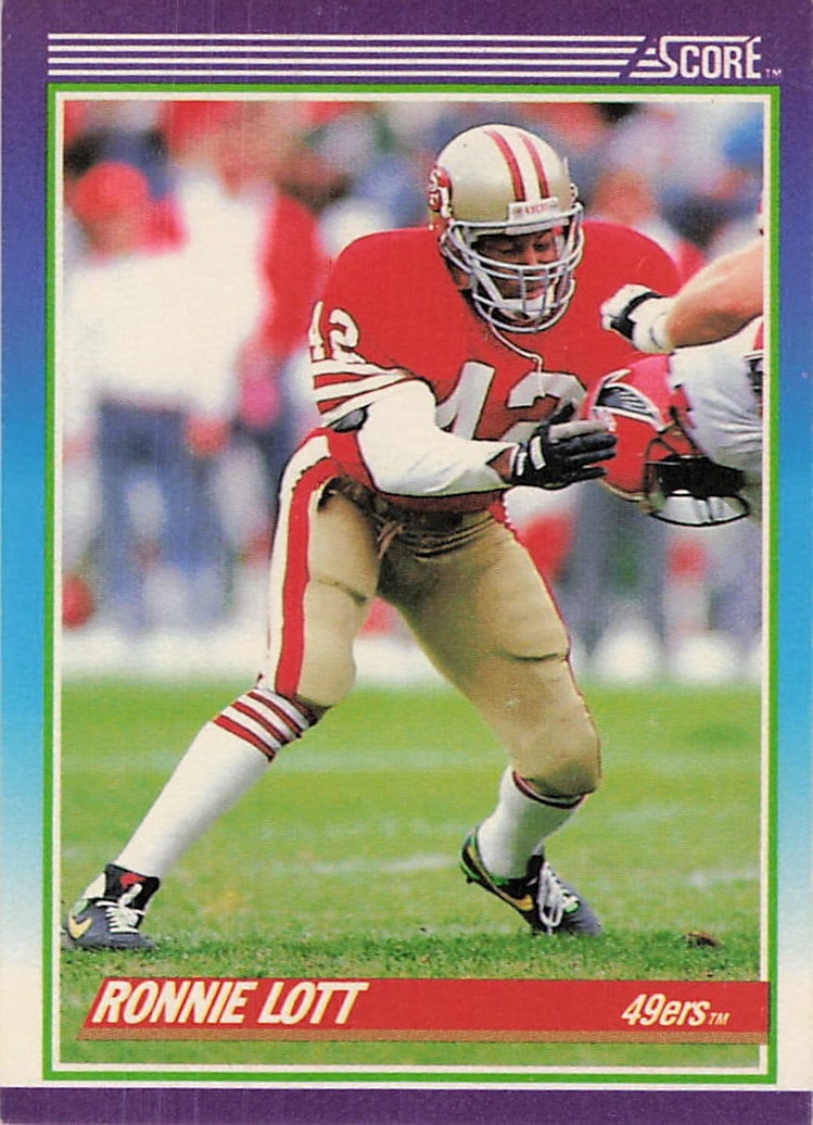 1990 Score Ronnie Lott #362 San Francisco 49ers Card: This is a 1990 Score football card featuring Hall of Fame defensive back Ronnie Lott of the San Francisco 49ers. The card showcases action photography of Lott during game play and is identified as
