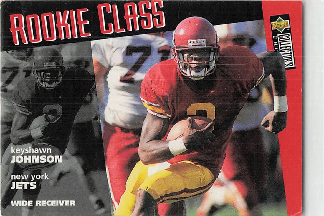 1996 Upper Deck Keyshawn Johnson Rookie Class Football Card: This is a 1996 Upper Deck Rookie Class football card featuring Keyshawn Johnson. The card highlights his transition from his USC college career to the NFL as a wide receiver for the New York Jets. It