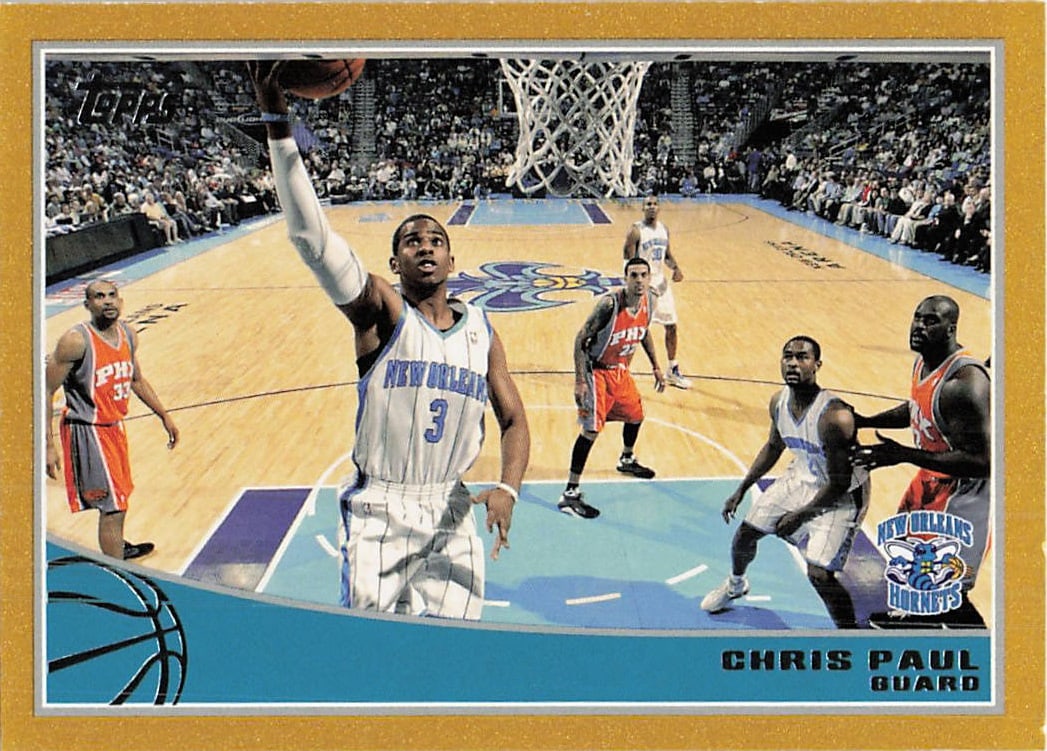 2008-09 Topps Chris Paul Gold Border Parallel: This is a 2008-09 Topps basketball trading card featuring Chris Paul of the New Orleans Hornets, card number 14. The card is a gold border parallel, which is visually distinct from the standard base