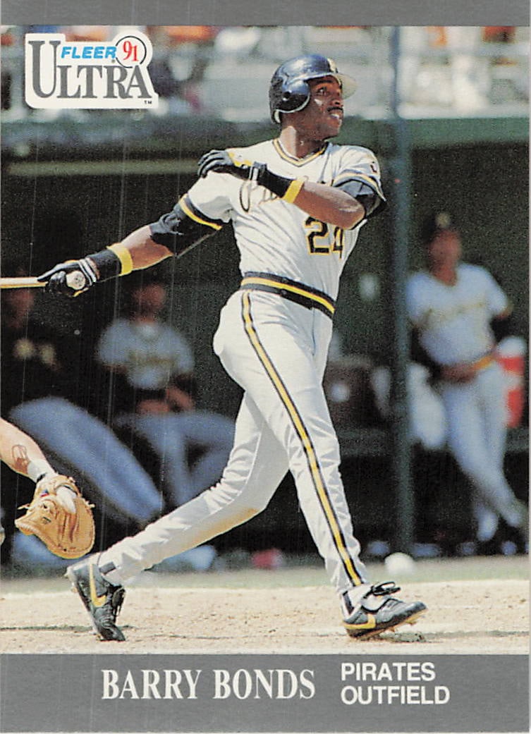 1991 Fleer Ultra Barry Bonds Baseball Card: This is a 1991 Fleer Ultra baseball card featuring Pittsburgh Pirates outfielder Barry Bonds, card number 24. The card showcases a full-bleed action photograph of the legendary slugger mid-swing