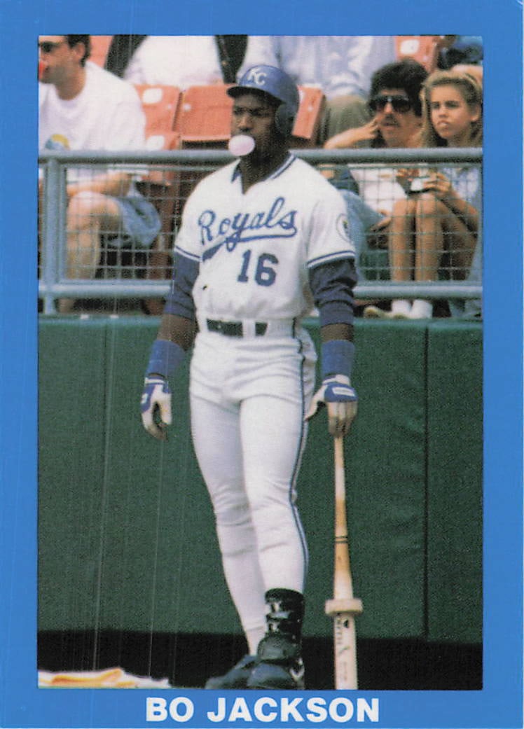 1989 Topps Bo Jackson Kansas City Royals Baseball Card: This is a 1989 Topps baseball card, number 565, featuring legendary multi-sport athlete Bo Jackson playing for the Kansas City Royals. The card captures an iconic image of Jackson standing at the