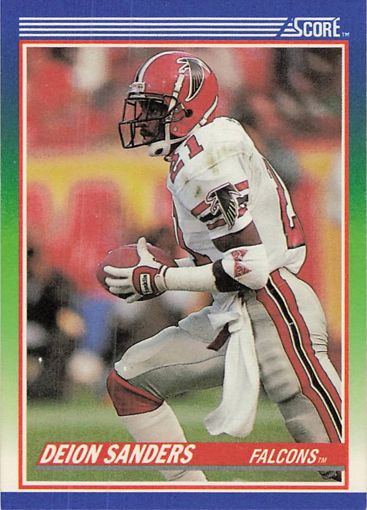 1990 Score Deion Sanders Atlanta Falcons Football Card: This is a 1990 Score football card featuring Pro Football Hall of Famer Deion Sanders in his Atlanta Falcons uniform. The card, card number 21, showcases the legendary cornerback and return