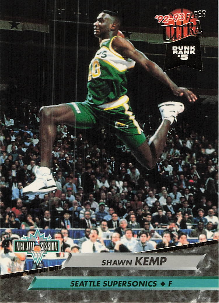 1992-93 Fleer Ultra Shawn Kemp Dunk Rank Insert: This is a 1992-93 Fleer Ultra 'Dunk Rank' insert card featuring Seattle SuperSonics power forward Shawn Kemp. The card showcases a dynamic action shot of Kemp performing one of his signature