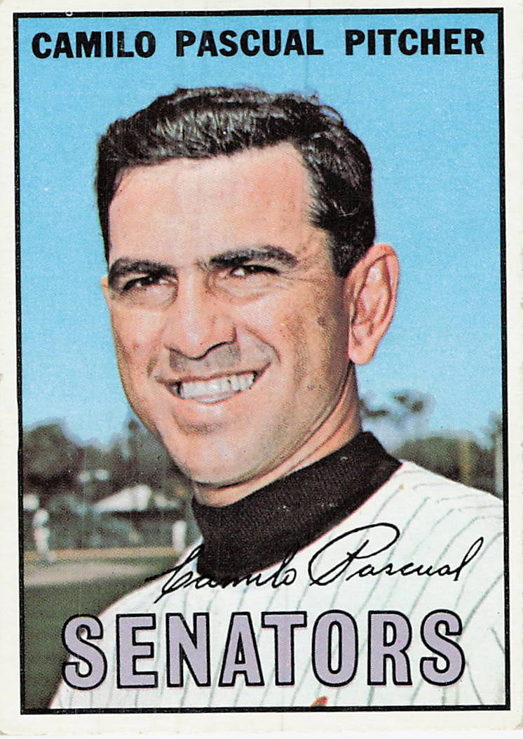 1967 Topps Camilo Pascual #210 Washington Senators: This is a 1967 Topps baseball card featuring Washington Senators pitcher Camilo Pascual, card number 210. The card showcases a classic close-up portrait of the Cuban-born hurler with his facsimile