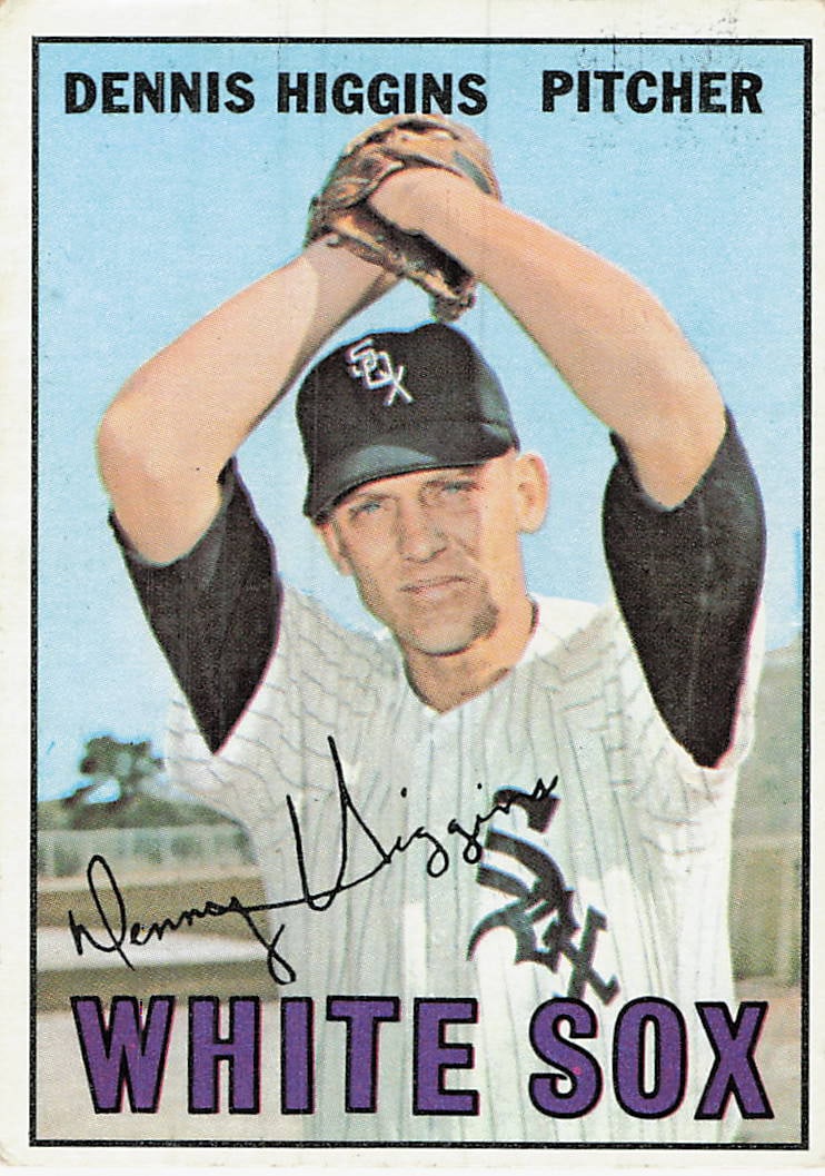1967 Topps Dennis Higgins Chicago White Sox Baseball Card: This is a 1967 Topps baseball card, number 563, featuring relief pitcher Dennis Higgins of the Chicago White Sox. The card showcases a classic portrait-style shot of Higgins in his home pinstripe
