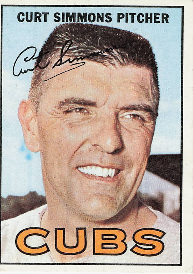 1967 Topps Curt Simmons Chicago Cubs Baseball Card: This is a 1967 Topps baseball card featuring pitcher Curt Simmons, who was playing for the Chicago Cubs at the time. The card, numbered 384, showcases a classic close-up portrait of Simmons with the