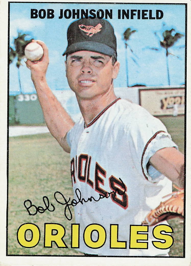 1967 Topps Bob Johnson Baltimore Orioles Card #320: This is a 1967 Topps baseball card featuring Bob Johnson of the Baltimore Orioles, card number 320. The card showcases a portrait of the infielder in his home uniform, complete with a facsimile
