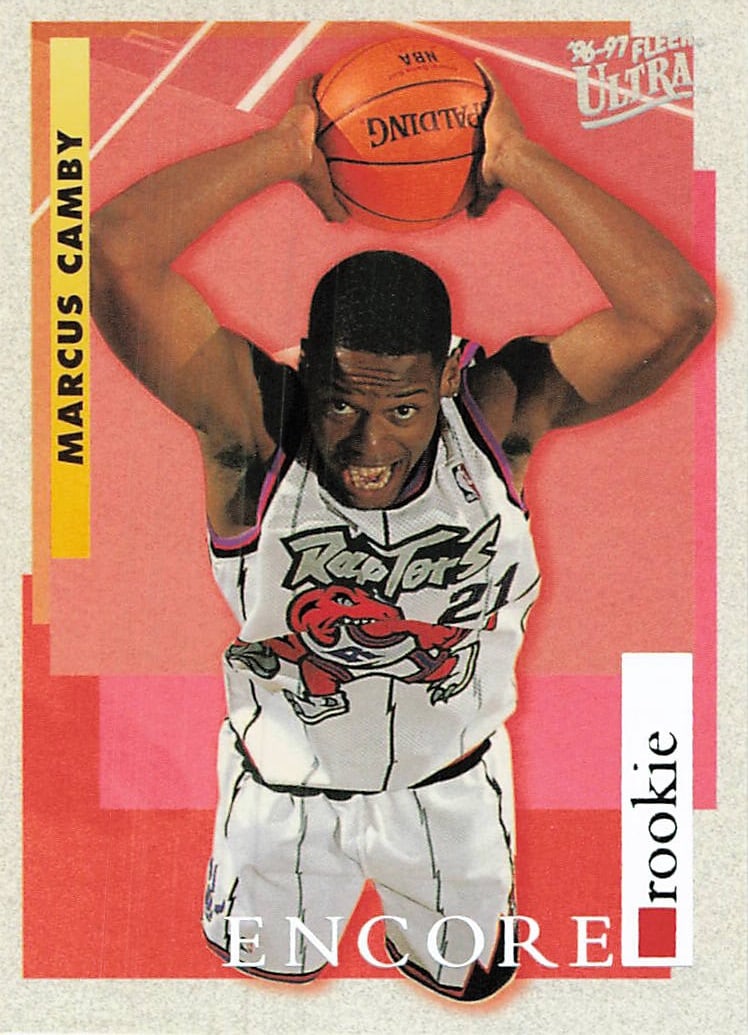 1996-97 Fleer Ultra Encore Marcus Camby Rookie Card: This is a 1996-97 Fleer Ultra 'Encore' rookie trading card featuring NBA player Marcus Camby. The card displays Camby in his Toronto Raptors jersey in a unique, inverted portrait orientation. As a not