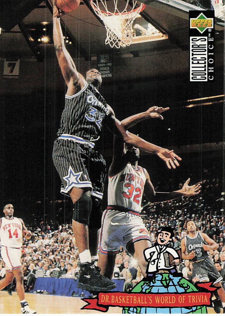 1994-95 Upper Deck Shaquille O'Neal Dr. Basketball Trivia Ca: This is a 1994-95 Upper Deck Collector's Choice basketball card featuring Shaquille O'Neal. The card is titled 'Dr. Basketball's World of Trivia' and highlights O'Neal in his iconic Orlando Magic pins