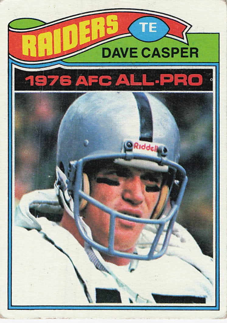 1977 Topps Dave Casper Oakland Raiders Football Card: This is a 1977 Topps football card, number 188, featuring Pro Football Hall of Fame tight end Dave Casper of the Oakland Raiders. The card commemorates his 1976 AFC All-Pro selection with a portrait s