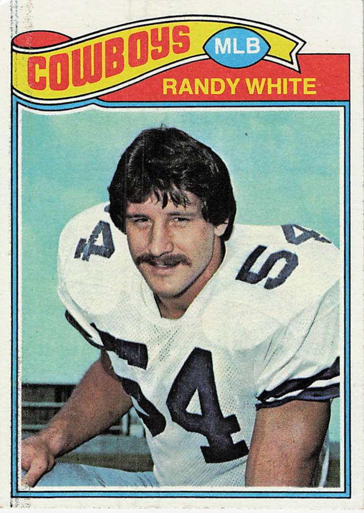 1977 Topps Randy White: This is a 1977 Topps football card featuring Dallas Cowboys defensive lineman Randy White.