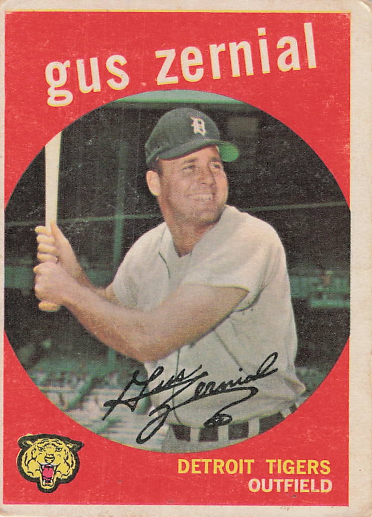 1963 Topps Gus Zernial Detroit Tigers Baseball Card: This is a 1963 Topps baseball card featuring Gus Zernial of the Detroit Tigers. The card shows Zernial in a batting pose, accented by a bold red background, his printed autograph, and the iconic