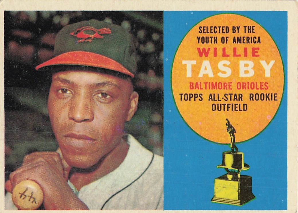 1960 Topps Willie Tasby All-Star Rookie Baseball Card: This is a 1960 Topps baseball card, card number 494, featuring Willie Tasby of the Baltimore Orioles. The card highlights his selection as an 'All-Star Rookie' by the Youth of America, marked by an ic