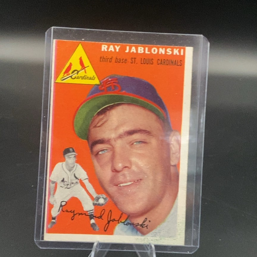 1954 Topps Ray Jablonski #26 baseball card: This is a 1954 Topps baseball card featuring St. Louis Cardinals third baseman Ray Jablonski. The card displays a close-up portrait alongside a smaller full-body image and the player's signature. It