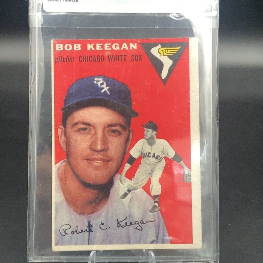 1954 Topps #100 Bob Keegan baseball card: This is a 1954 Topps baseball card featuring Bob Keegan of the Chicago White Sox. The card showcases Keegan in his White Sox uniform with the classic 1954 Topps design and colorful illustrated