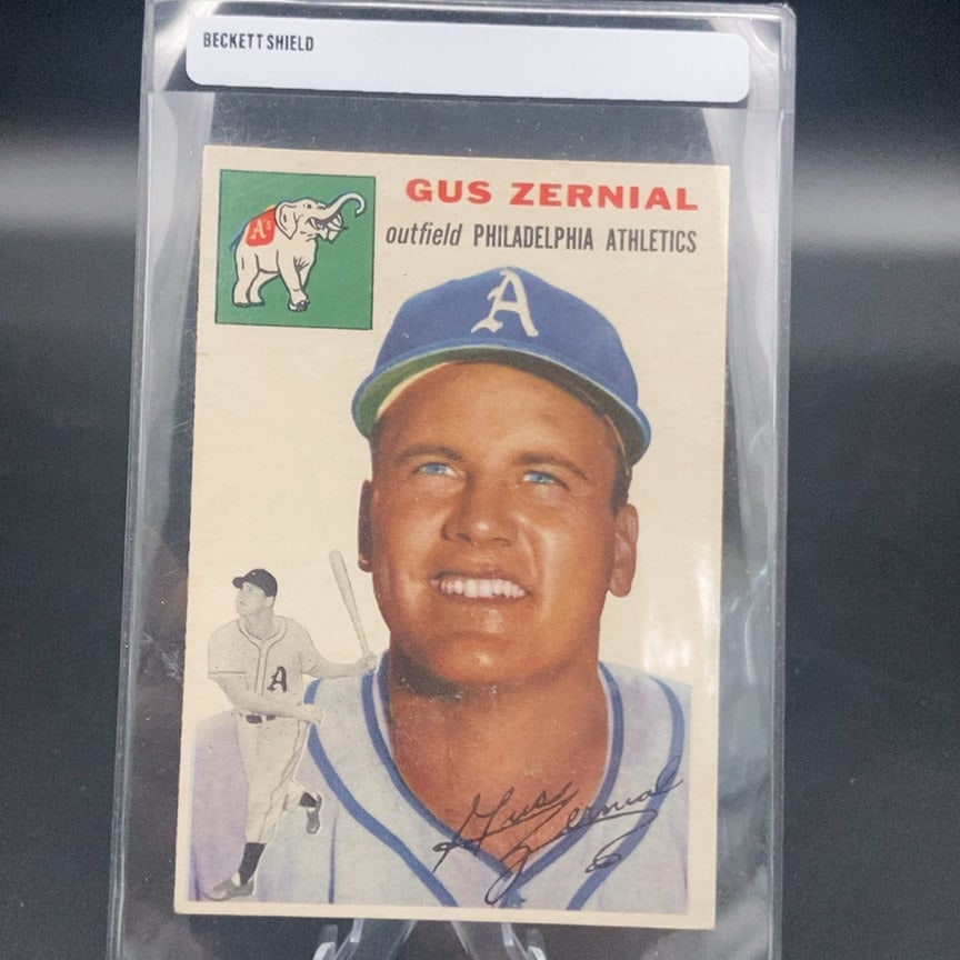 1954 Topps Baseball Card #2 featuring outfielder Gus Zernial: This is a vintage trading card featuring Gus Zernial, an outfielder for the Philadelphia Athletics. The card includes a portrait of the player along with his printed autograph and the team's elephant