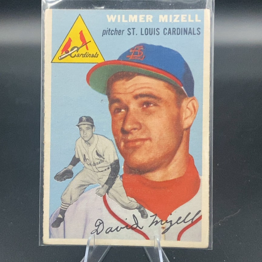 1954 Topps baseball card of left-handed pitcher Wilmer "Vinegar Bend" Mizell: This is a 1954 Topps baseball card featuring St. Louis Cardinals pitcher Wilmer Mizell. The card displays a large portrait and an inset action shot of the player along with his facsimile signature.