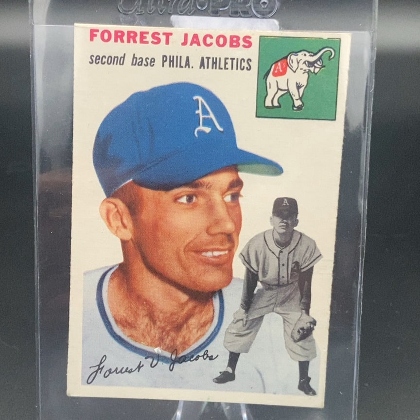 1954 Topps Forrest Jacobs #129 rookie card: This is a vintage baseball card featuring Forrest Jacobs, who played as a second baseman for the Philadelphia Athletics. The card features a portrait of the player alongside a full-body action pose