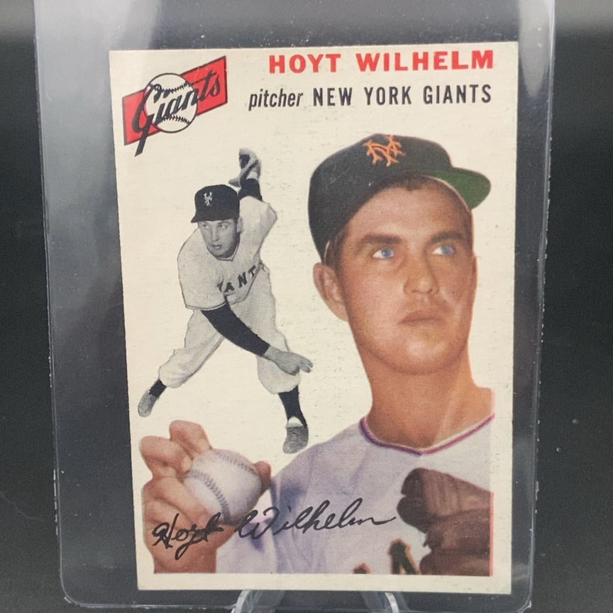 1954 Topps #36 Hoyt Wilhelm baseball card: This is a vintage baseball card featuring pitcher Hoyt Wilhelm of the New York Giants. The front displays both a portrait and a full-body action shot, along with a facsimile signature.