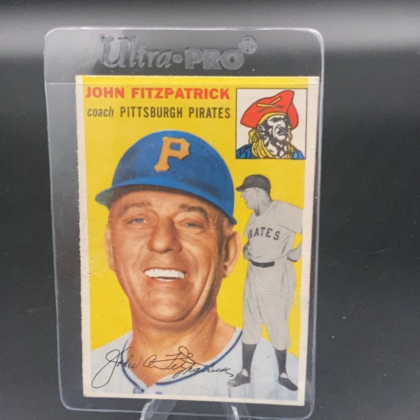 1954 Topps baseball card featuring John FitzPark: This is a vintage sports trading card featuring John Fitzpatrick, identified as a coach for the Pittsburgh Pirates. The card features a portrait of the coach alongside a full-body action pose and the
