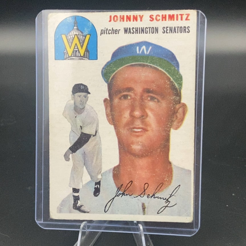 1954 Topps #33 Johnny Schmitz baseball card: This is a vintage baseball card featuring Johnny Schmitz of the Washington Senators. The card displays a portrait of the pitcher along with his printed autograph signature.