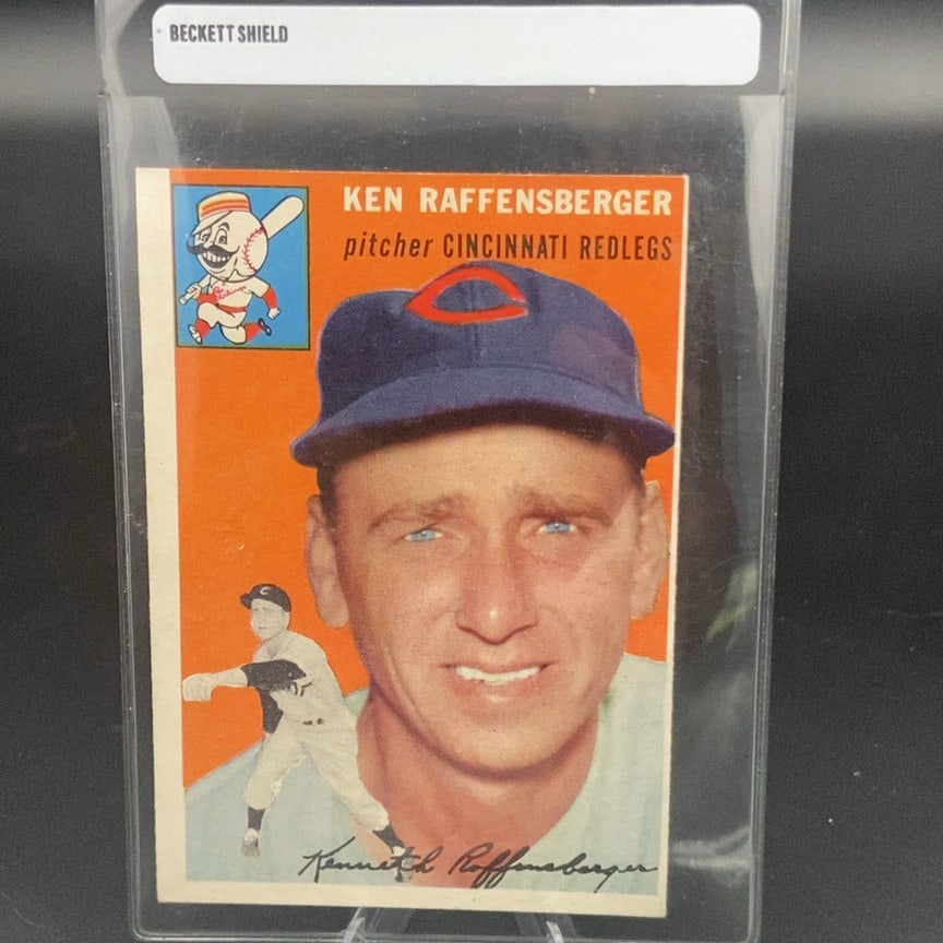 1954 Topps #46 baseball card featuring pitcher Ken Raffensberge: This is a vintage baseball card featuring pitcher Ken Raffensberger of the Cincinnati Redlegs. The card includes a portrait of the player alongside a smaller action shot of him in uniform. It is