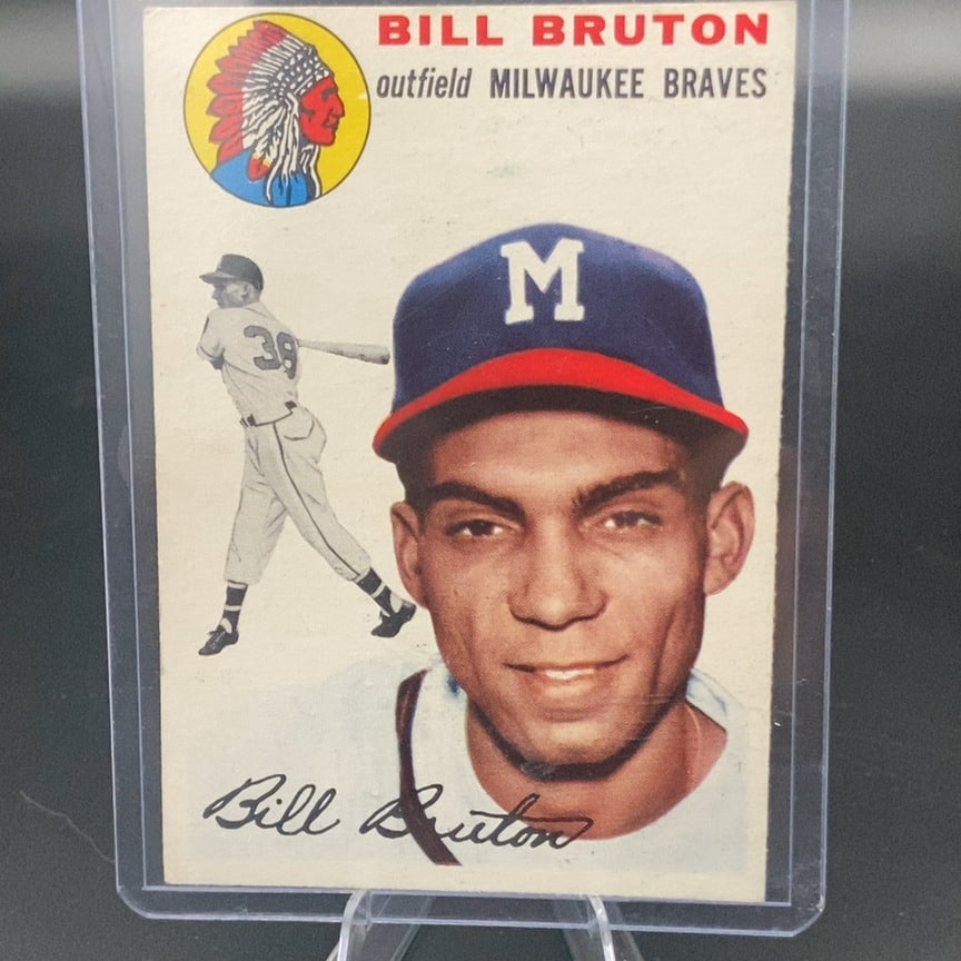 1954 Topps Bill Bruton Milwaukee Braves Baseball Card: This is a 1954 Topps baseball card featuring Milwaukee Braves outfielder Bill Bruton. The card features a portrait of the player, a smaller action shot, and the team logo in the top corner.