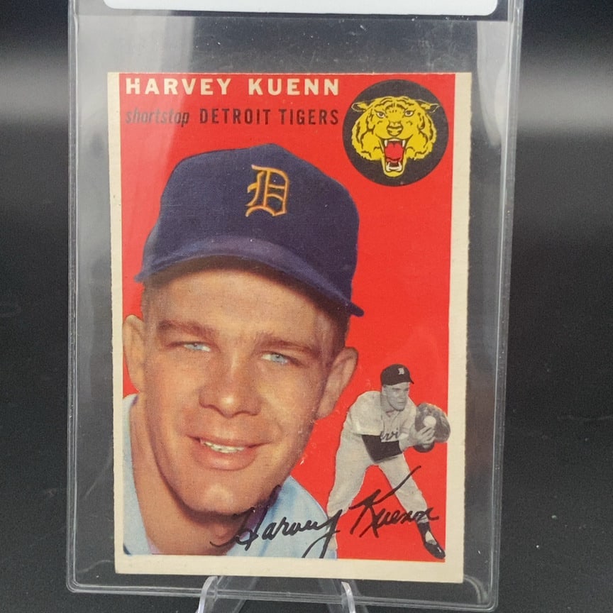1954 Topps Harvey Kuenn #25 baseball card: This is a vintage baseball card featuring Harvey Kuenn of the Detroit Tigers. The card displays a player portrait and an action figure pose, with the team logo visible in the top right corner. The