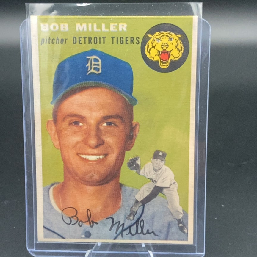 1954 Topps #241 Bob Miller rookie baseball card: This is a vintage baseball card featuring pitcher Bob Miller of the Detroit Tigers. The card displays a player portrait, his signature, and a small action figure graphic along with a Tiger emblem.