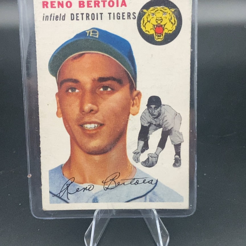 1954 Topps #131 Reno Bertoia rookie baseball card: This is a 1954 Topps baseball card featuring Detroit Tigers infielder Reno Bertoia. The card features a portrait of the player alongside a smaller action image of him in a fielding stance, complete wi