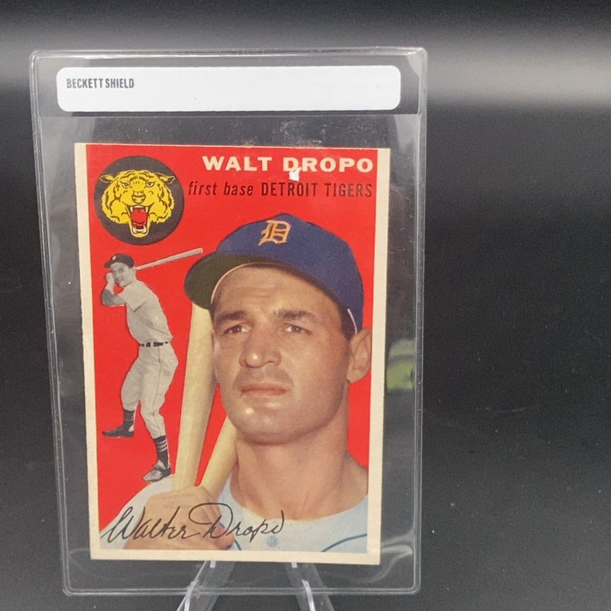 1954 Topps Walt Dropo Detroit Tigers Baseball Card: This is a 1954 Topps baseball card featuring Walt Dropo of the Detroit Tigers. The card displays a vibrant red background with a portrait of the player and a smaller full-body action shot. The card
