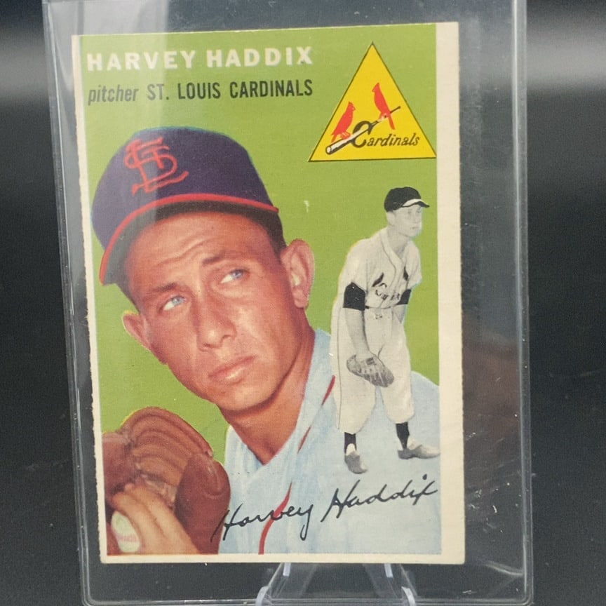 1954 Topps Harvey Haddix Baseball Card: This is a 1954 Topps baseball card featuring St. Louis Cardinals pitcher Harvey Haddix. The card includes a portrait of the player alongside a full-body action shot, with his printed signature at the