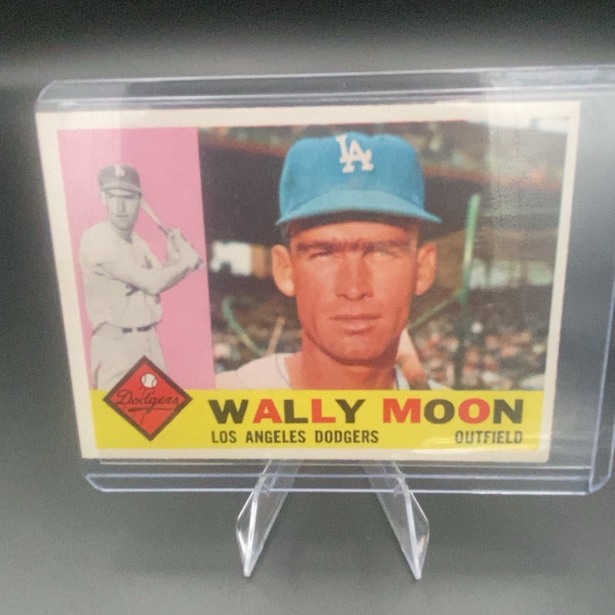 1960 Topps #5 Wally Moon vintage baseball card: This is a 1960 Topps baseball card featuring Wally Moon of the Los Angeles Dodgers. The card displays a portrait of the outfielder and includes a secondary inset image of him at bat.