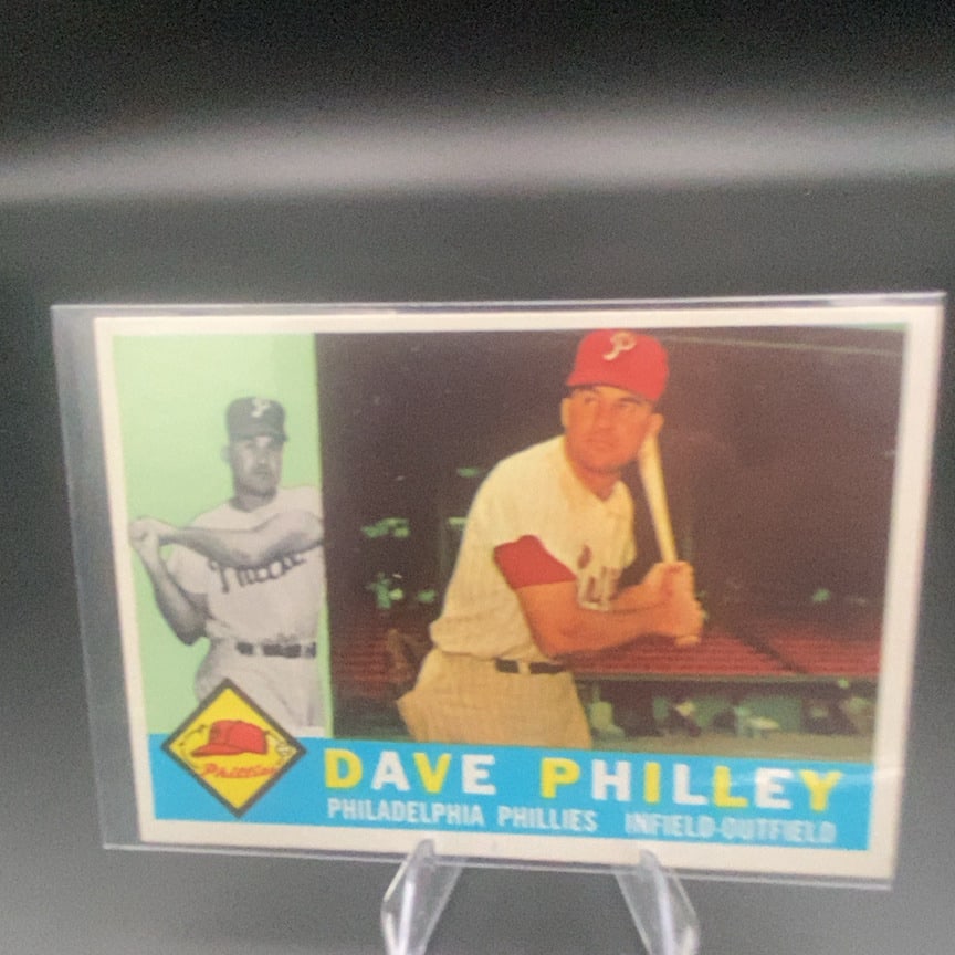 1960 Topps Dave Philley (#52) baseball card: This is a 1960 Topps baseball card featuring Dave Philley of the Philadelphia Phillies. The card features a dual-image design with a headshot insert and a batting action photo, identifying him as an