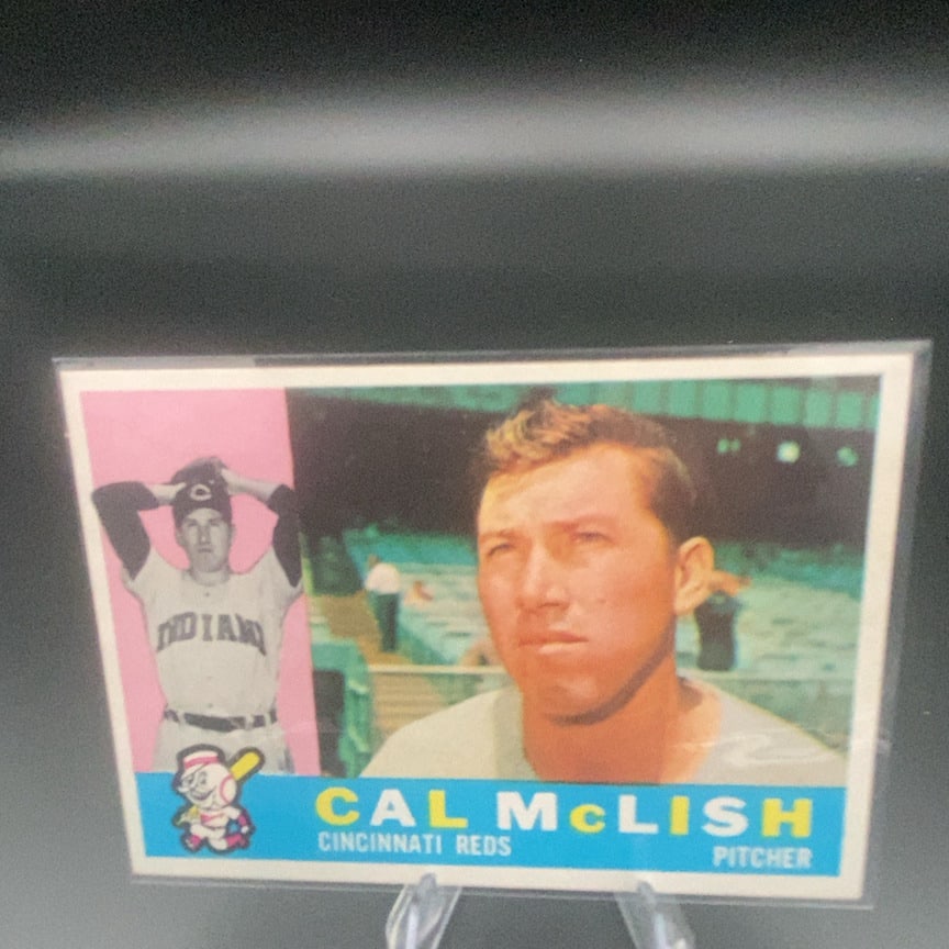 1960 Topps baseball card (#110) featuring pitcher Cal McLish: This is a 1960 Topps baseball card featuring Cal McLish of the Cincinnati Reds. The card features a portrait of the pitcher alongside a smaller action shot of him in his uniform.