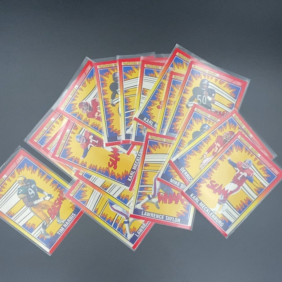 1990 Score Crunch Crew Trading Card Collection: A collection of 1990 Score 'Crunch Crew' NFL football trading cards. The set features prominent players like Tim Harris, Lawrence Taylor, and Karl Mecklenburg with a stylized comic-book aesthetic.