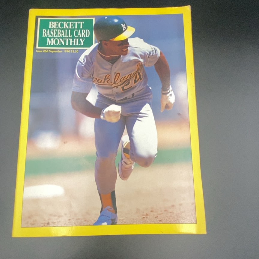 1990 Beckett Baseball Card Monthly Issue 66: This is a copy of Beckett Baseball Card Monthly magazine, issue number 66, published in September 1990. The cover features a photograph of a baseball player in an Oakland Athletics uniform. It is a