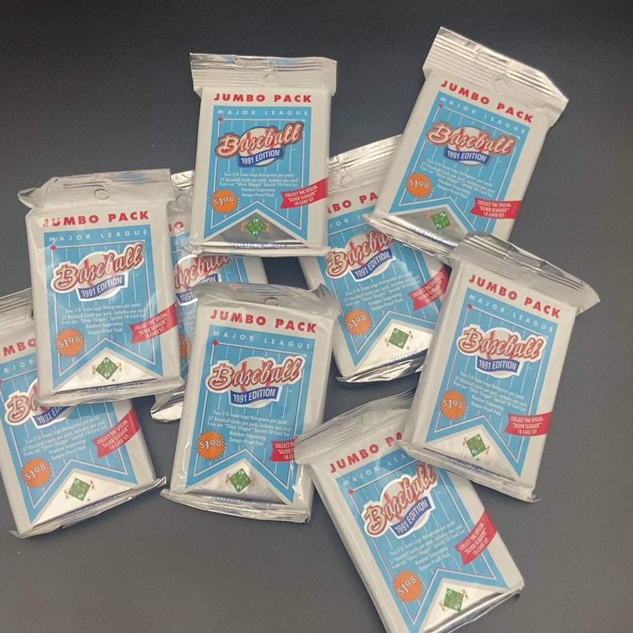 1991 Upper Deck Major League Baseball Jumbo Pack: This lot consists of multiple 1991 Upper Deck Major League Baseball jumbo packs. Each pack is a '1991 Edition' and includes 27 baseball cards along with two 3-D team logo holograms. They are