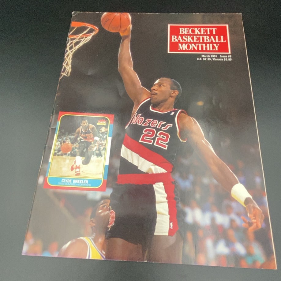 1991 #8 of Beckett Basketball Monthly featuring Portland Trail Blazers star Clyde Drexler: This is a copy of the March 1991 issue of Beckett Basketball Monthly, featuring Portland Trail Blazers star Clyde Drexler on the cover. The magazine includes a prominent image of Drexler dunking and