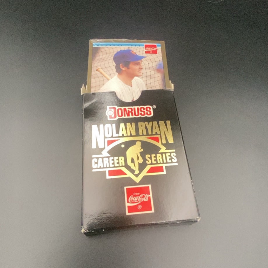 1992 Donruss Coca-Cola Nolan Ryan Career Series boxed card set: This is a 1992 Donruss Nolan Ryan Career Series boxed card set. The packaging features prominent branding from both Donruss and Coca-Cola, highlighting a collection dedicated to the career of baseball
